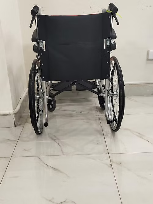Karma Ryder 5 Manual Wheelchair – Lightweight Foldable Mild Steel Frame | Flip-Up Footrests | Attendant Brakes | Compact, Travel-Friendly | 100kg Weight Capacity